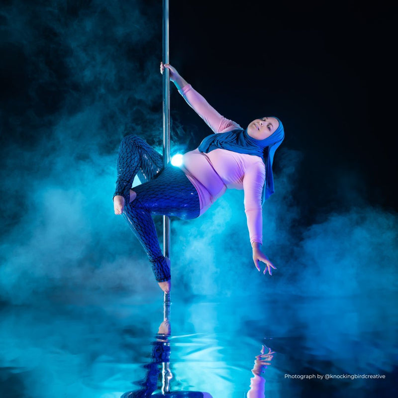 pole dancer in sfh sticky fishnet leggings in blue sea