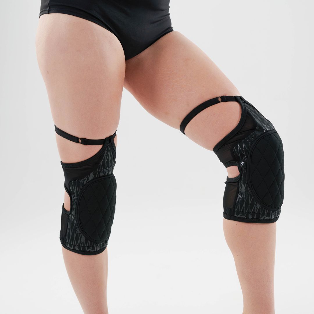 pole dancer in sticky garter kneepads in black