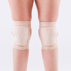 pole dancer in sticky gel knee pads in cream