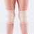 pole dancer in sticky gel knee pads in cream