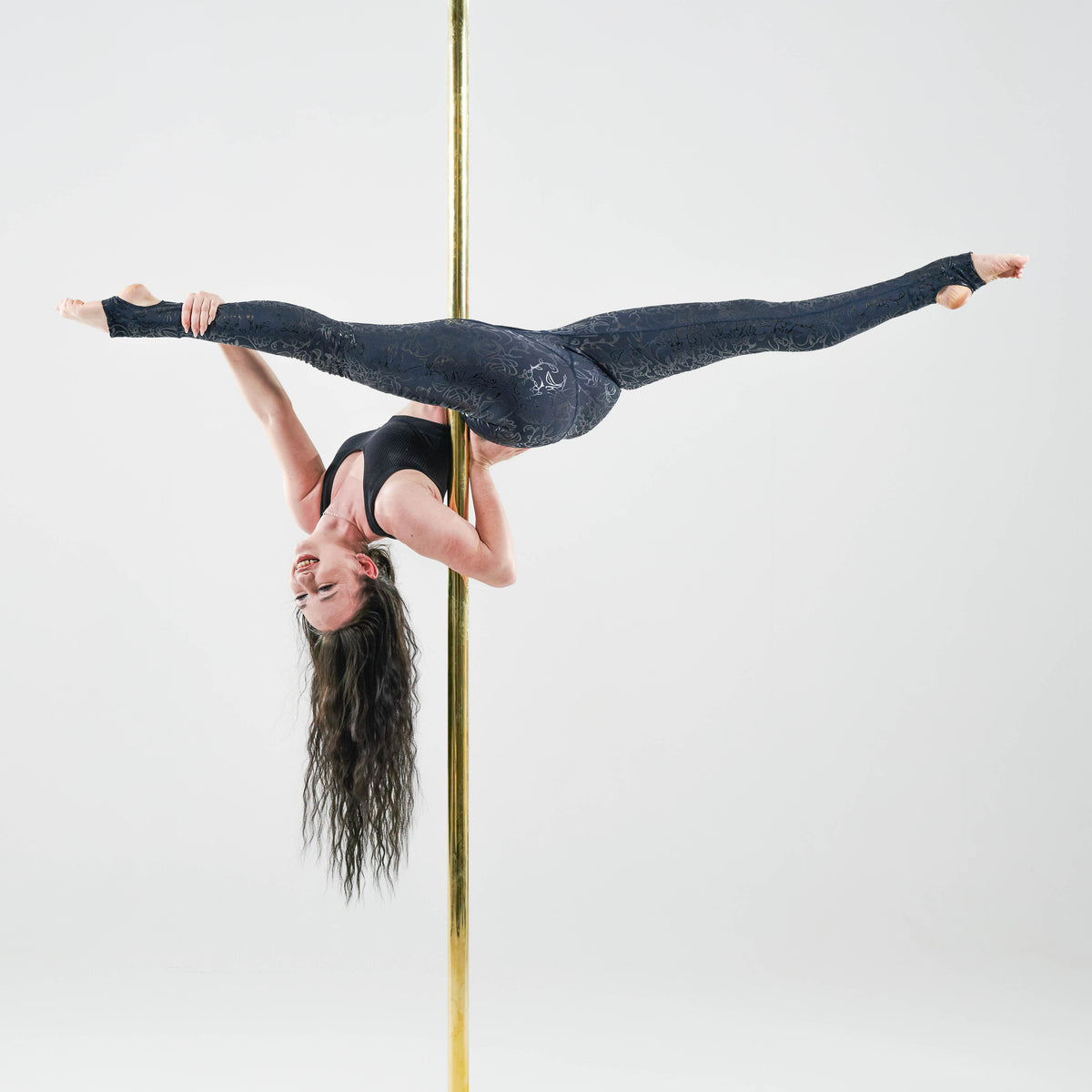 pole dancer in sticky skull &amp; roses  in smoke