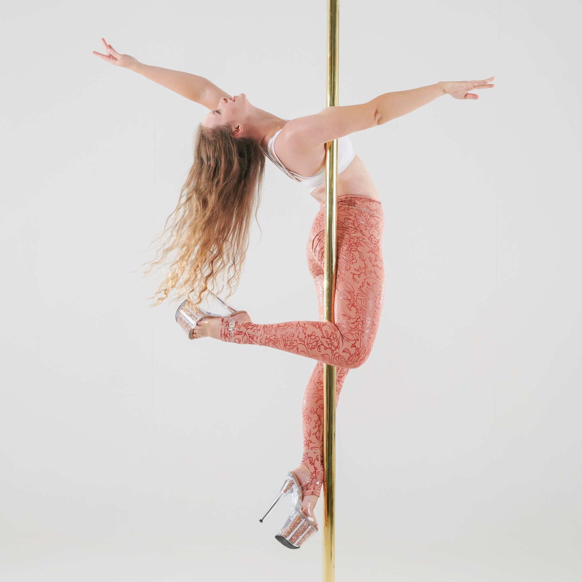 pole dancer in sticky skull & roses in salmon