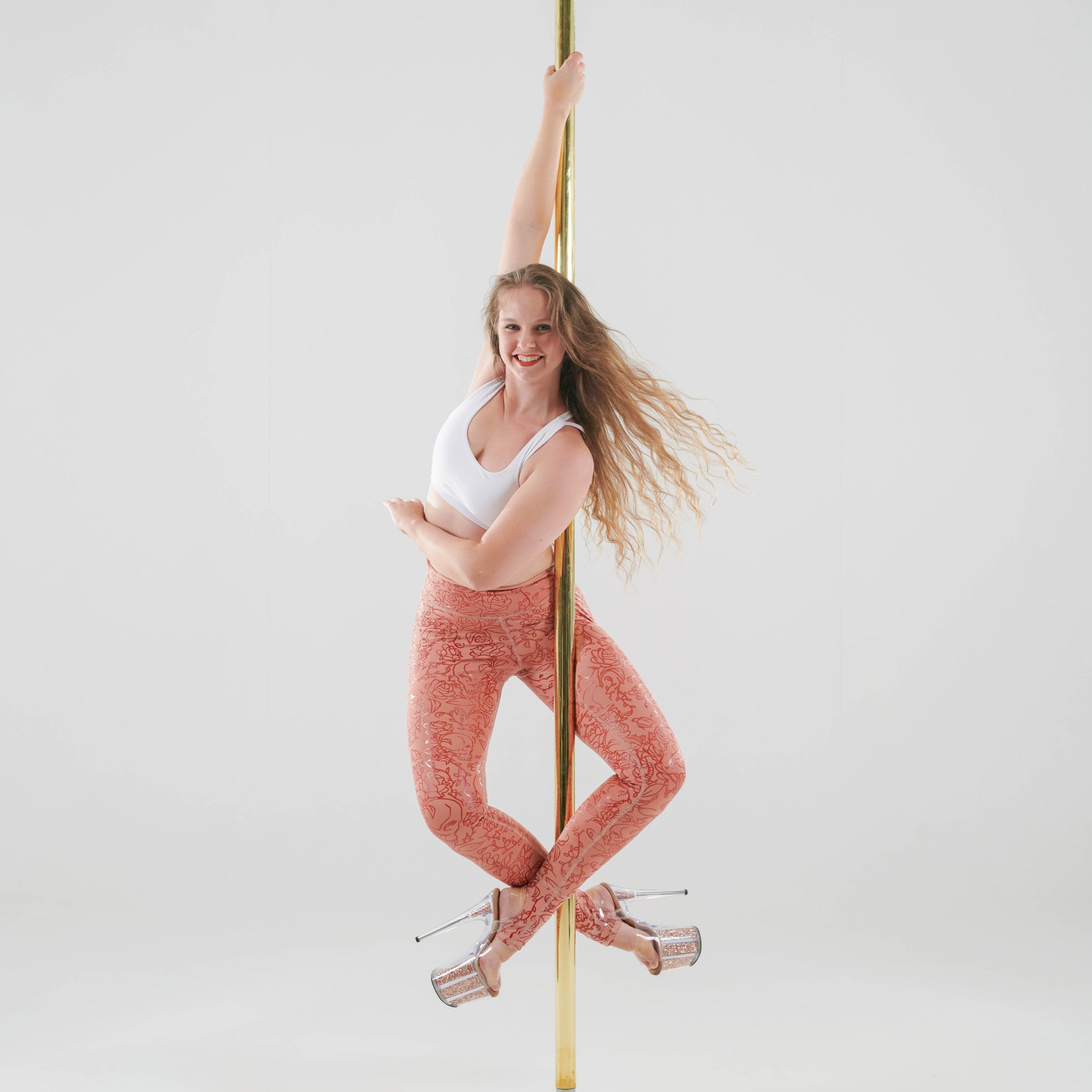 pole dancer in sticky skull & roses in salmon